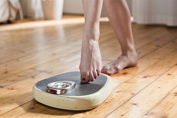 weighing on a scale